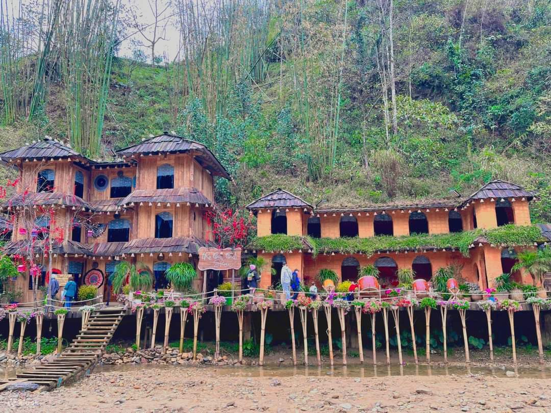Traditional wooden houses reflecting local life in Cat Cat Village Sapa