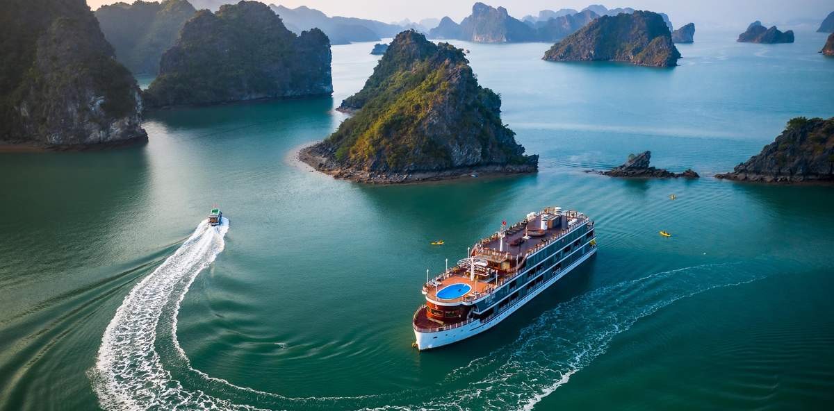 Vietnam holiday packages 2026 experiencing scenic cruising through Halong Bay