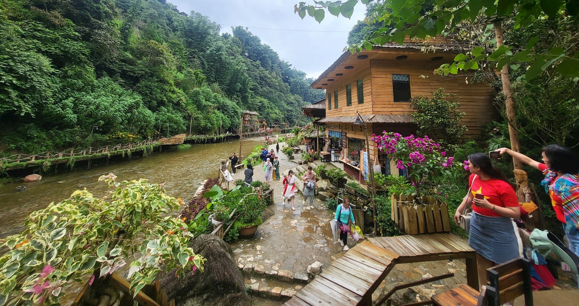 Visitors learning about local culture during a Cat Cat Village Sapa tour