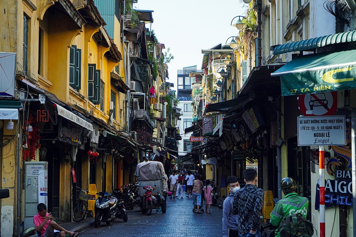 Busy streets and colonial architecture in Hanoi Old Quarter