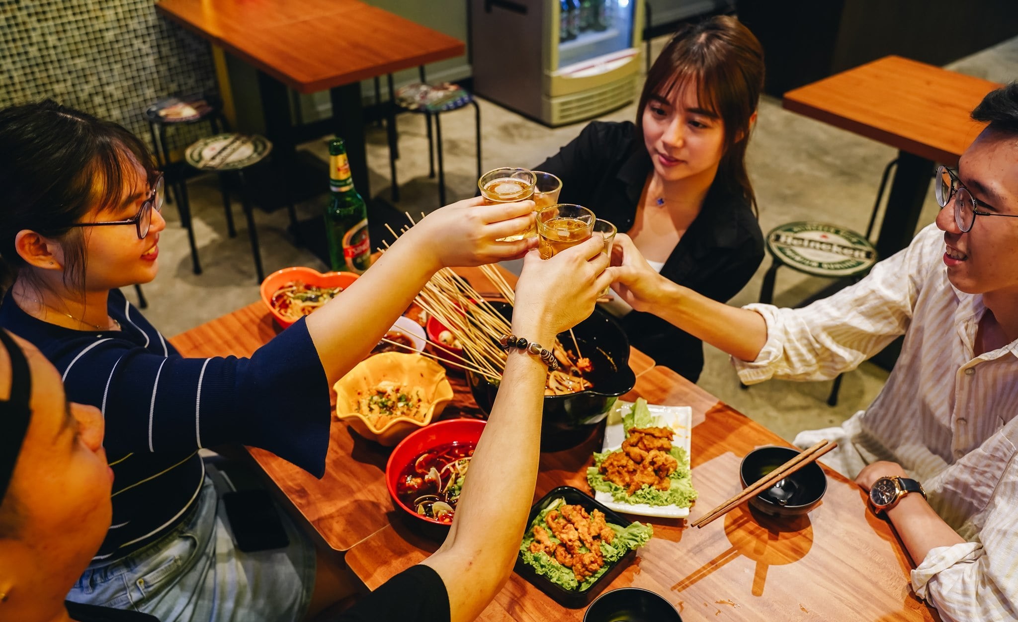Friends enjoying drinks in a relaxed atmosphere