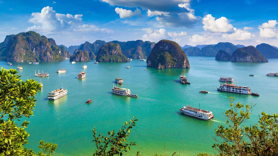 Limestone karsts rising from emerald waters in Ha Long Bay