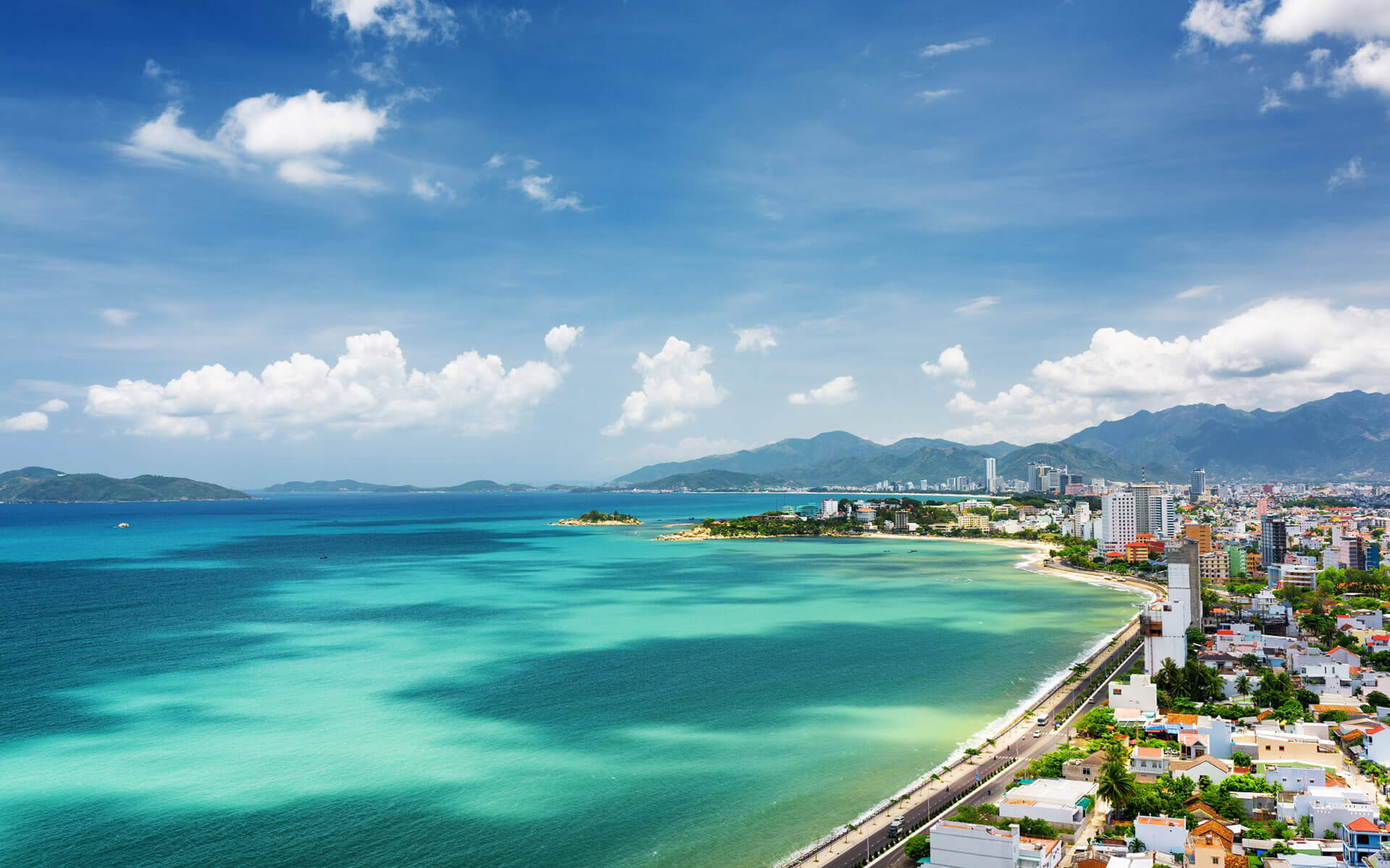 Nha Trang Beach with clear water and city views along Vietnam’s central coastline
