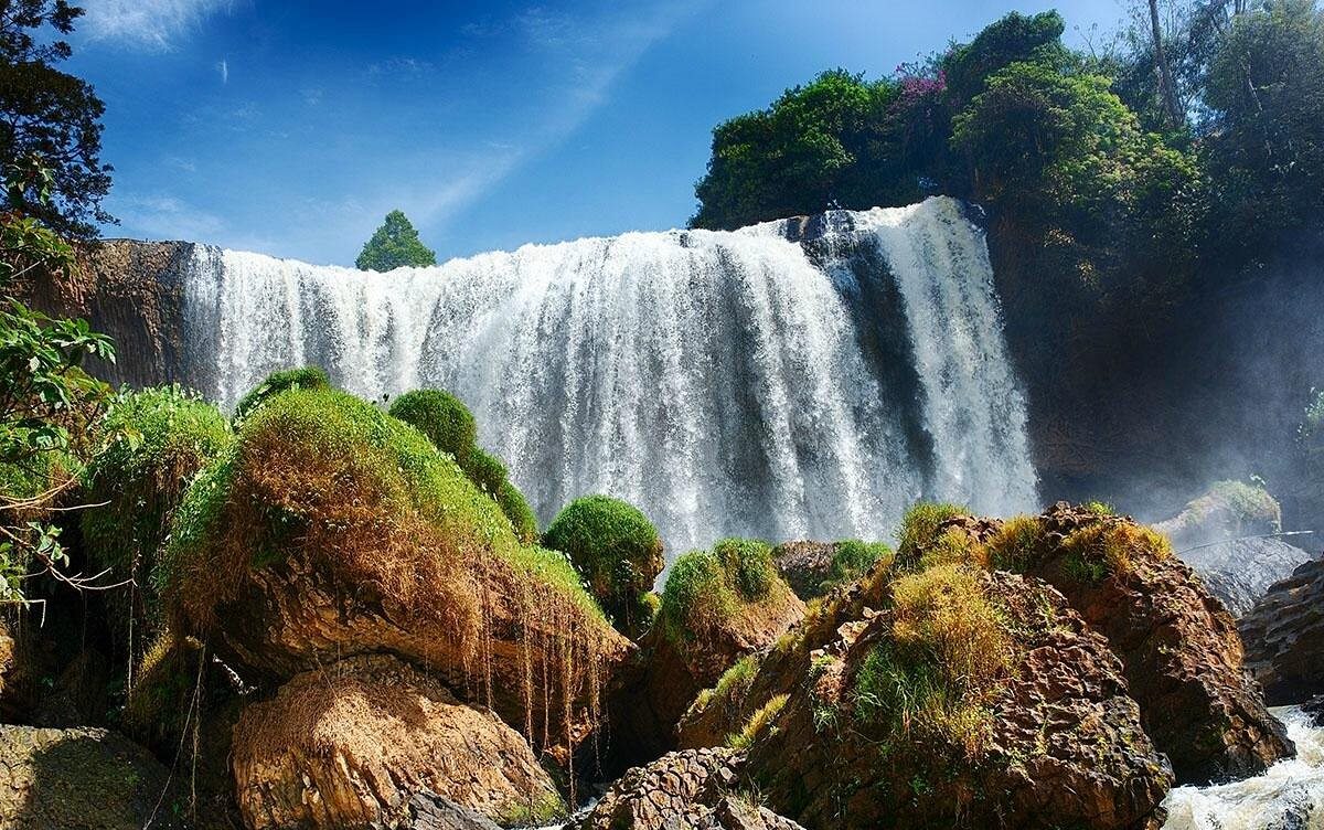 Powerful Elephant Waterfall flowing over basalt rocks near Da Lat