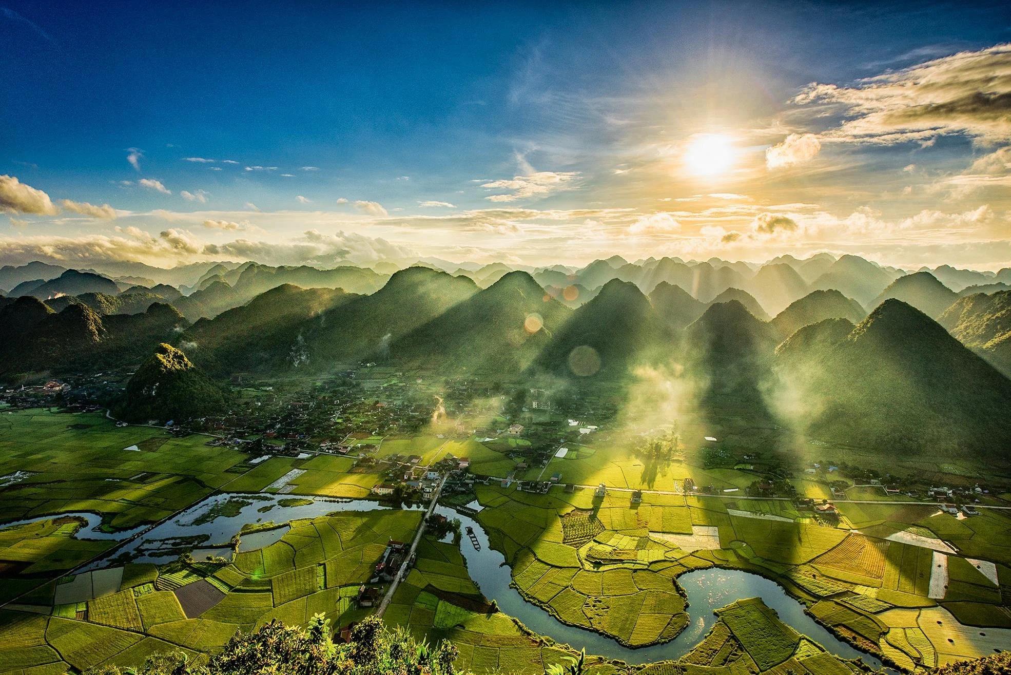 Sunrise over misty mountain landscapes in northern Vietnam