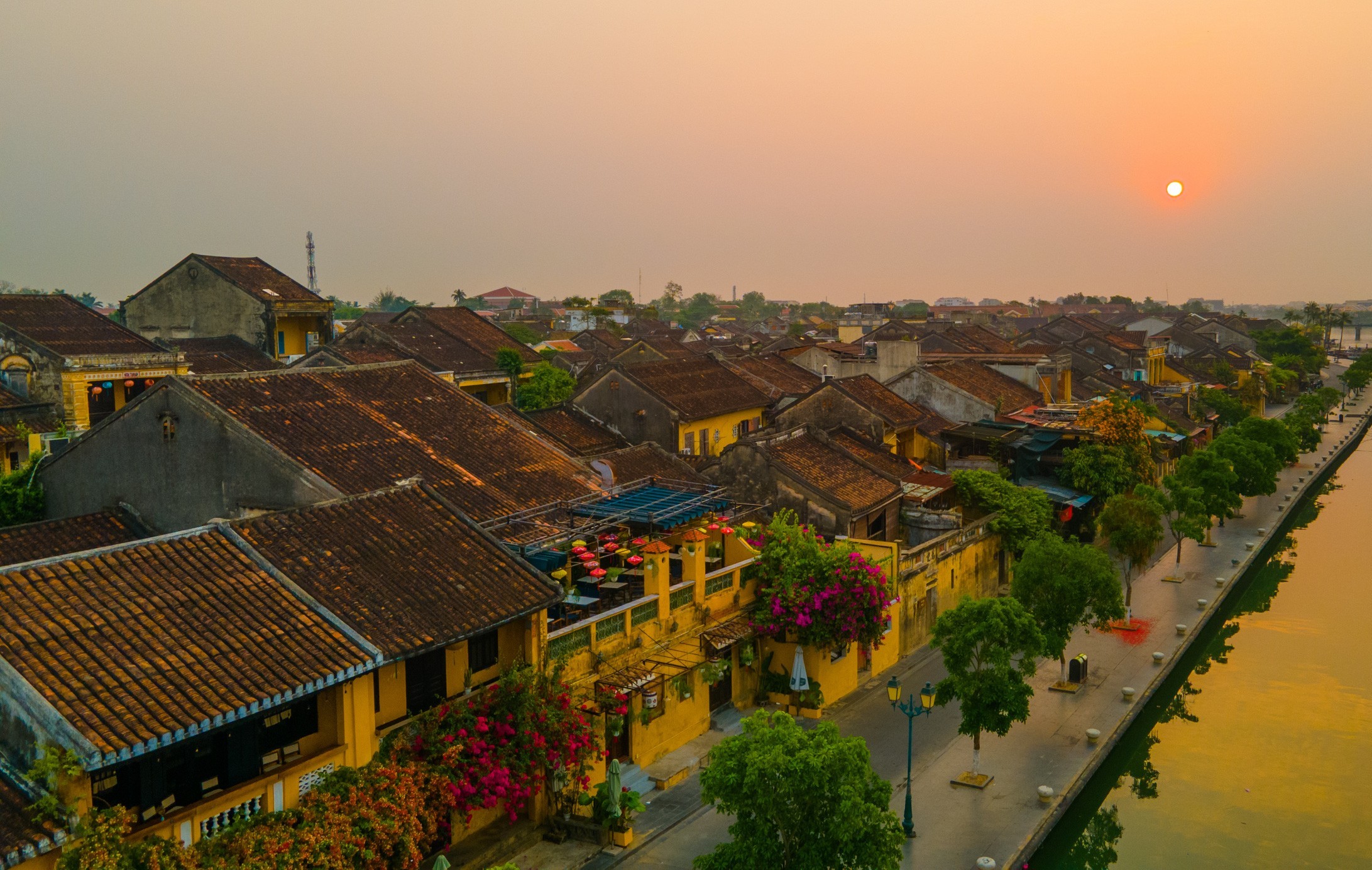 Aerial view of Hoi An Ancient Town with lantern-lit streets and the Thu Bon River