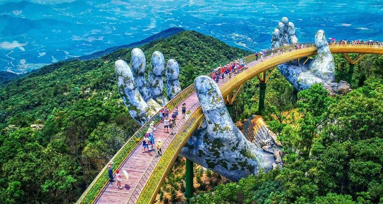 Golden Bridge supported by giant stone hands in Ba Na Hills