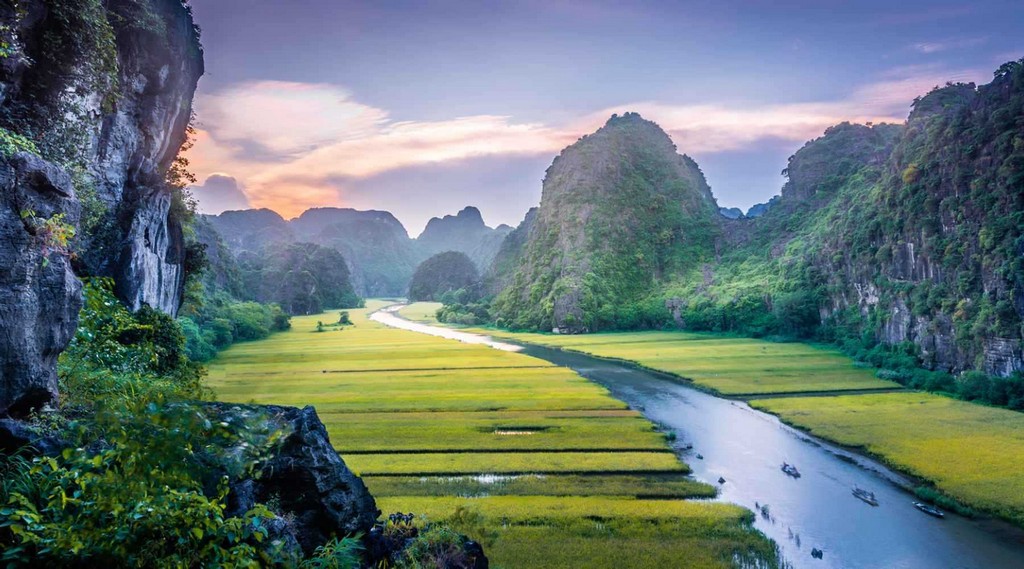 Limestone mountains and winding river landscape in Ninh Binh Vietnam