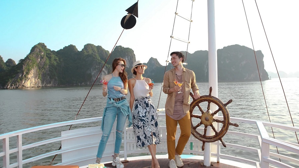 Travelers enjoying a relaxing cruise experience with scenic views of the bay