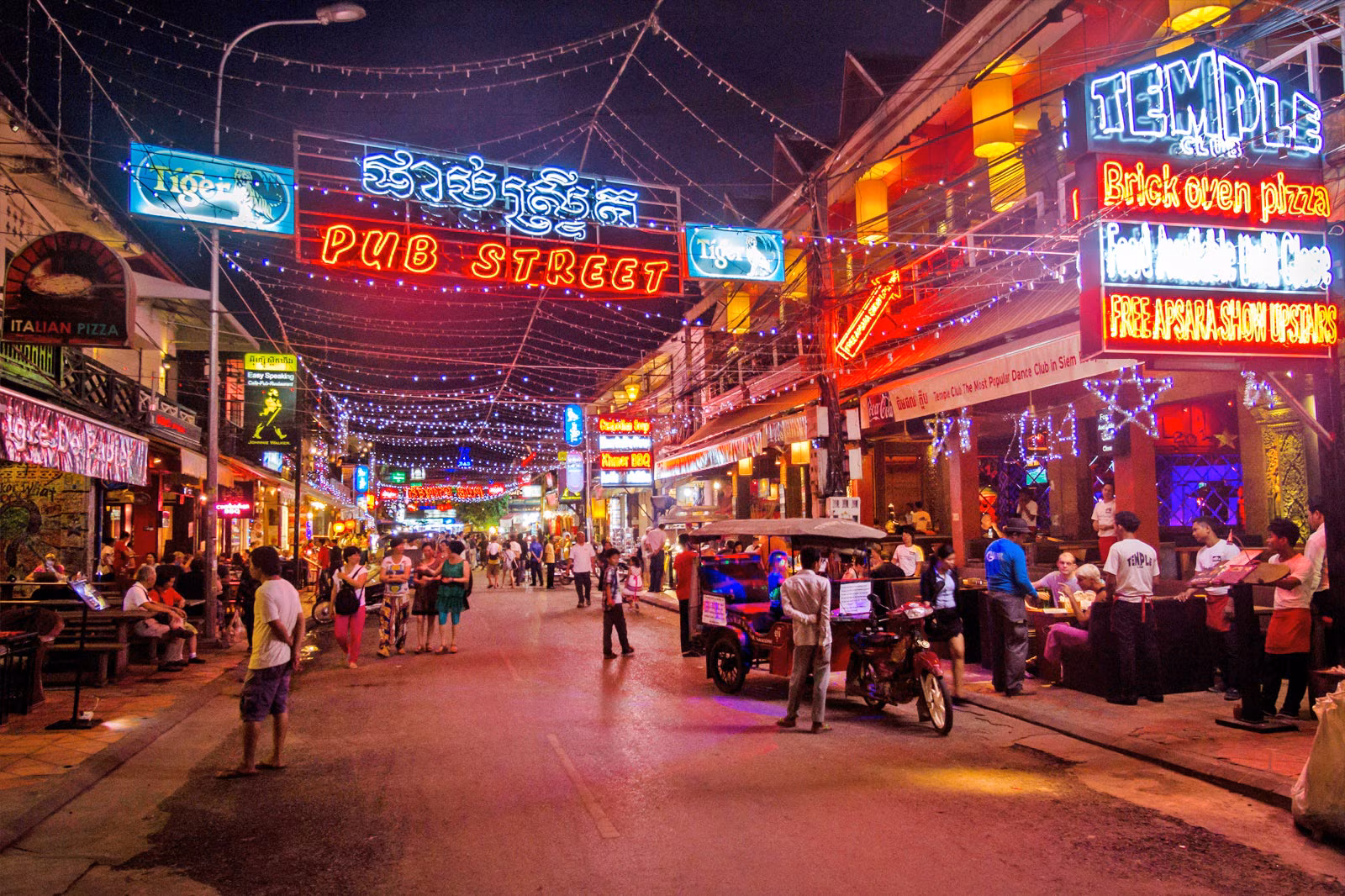 Night street scene in Siem Reap with markets and lively atmosphere