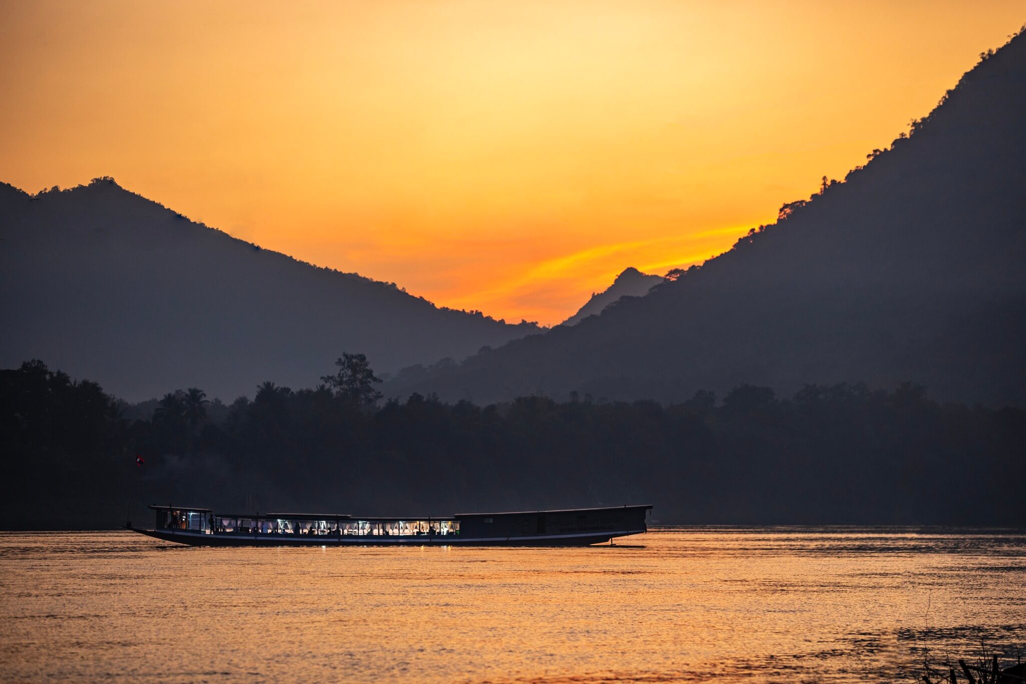 Sunset cruise on the Mekong River with Phnom Penh skyline