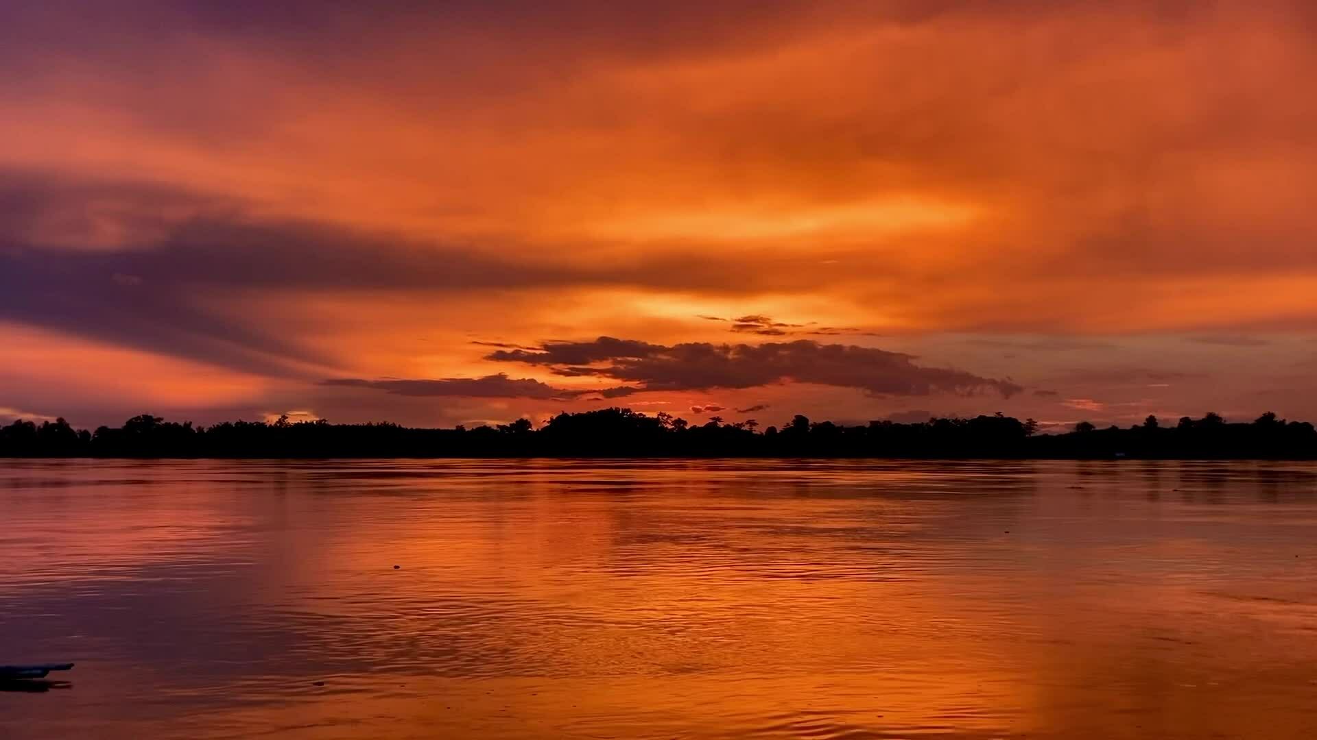 Sunset over Mekong river with peaceful atmosphere