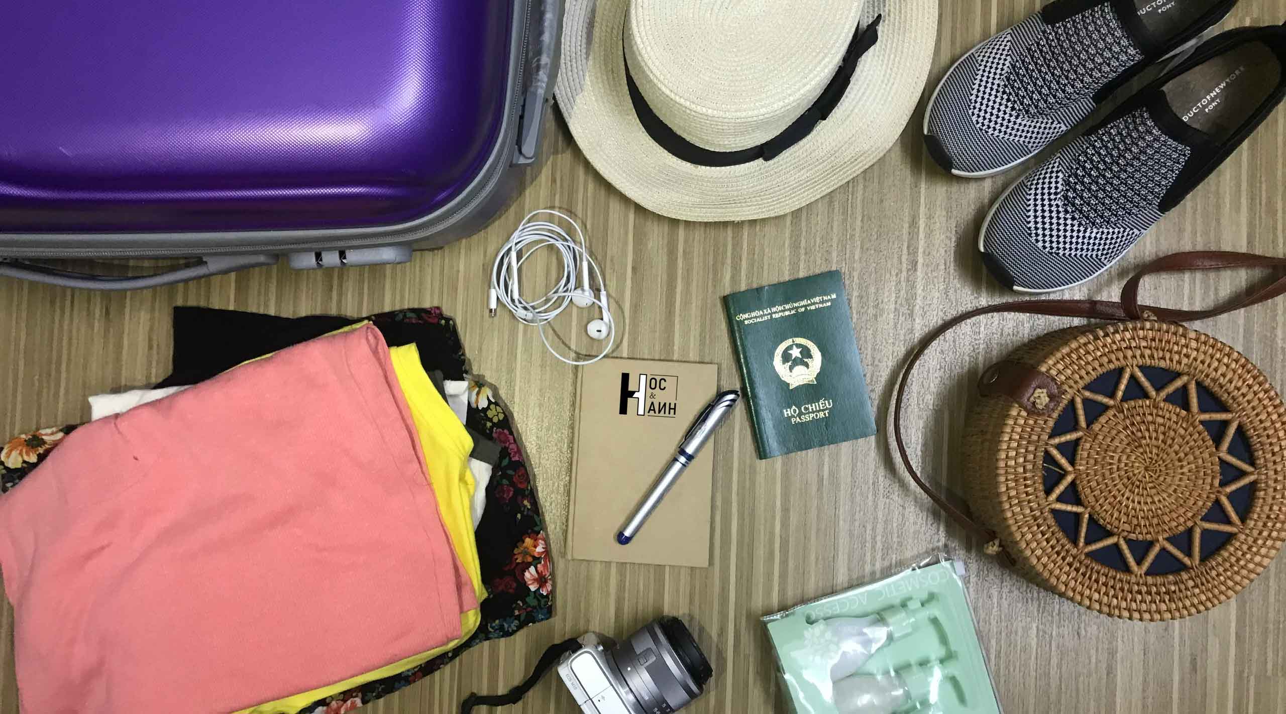 Travel planning essentials including map passport and travel guide for Southeast Asia