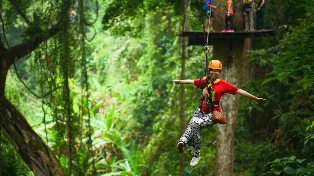 Travelers enjoying cultural and adventure activities in Southeast Asia