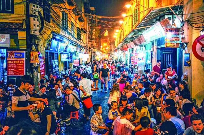 Discover Ha Noi Nightlife and Authentic Street Food by E-Scooter